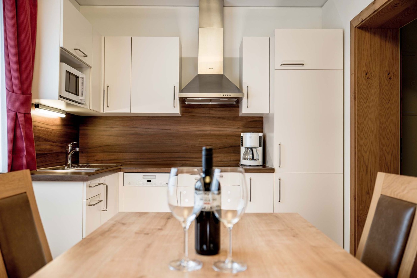 Küche und Essecke im COZY Apartment in die Barbara Appartements