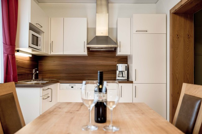 Küche und Esstisch im GRAND Apartment