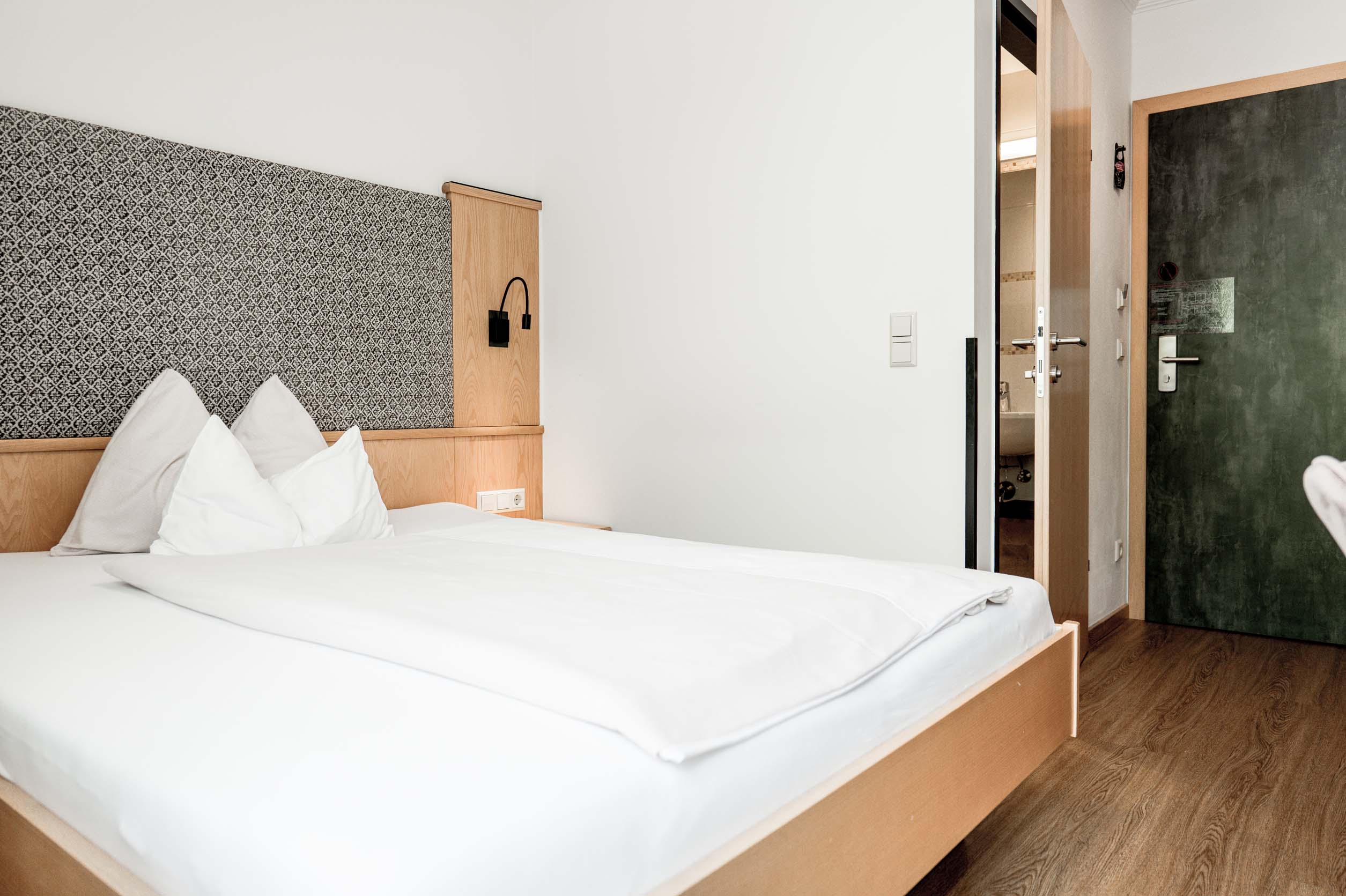 Queensize Bett im Hotel die Barbara